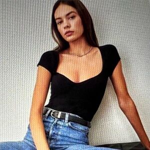 Two black Reformation t-shirts